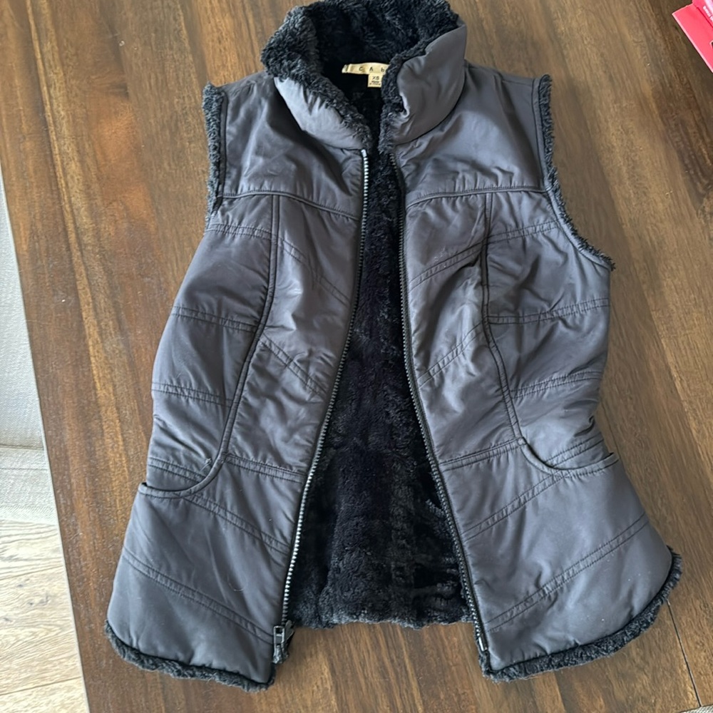 Cabi puffer vest with pockets. Faux fur lined.